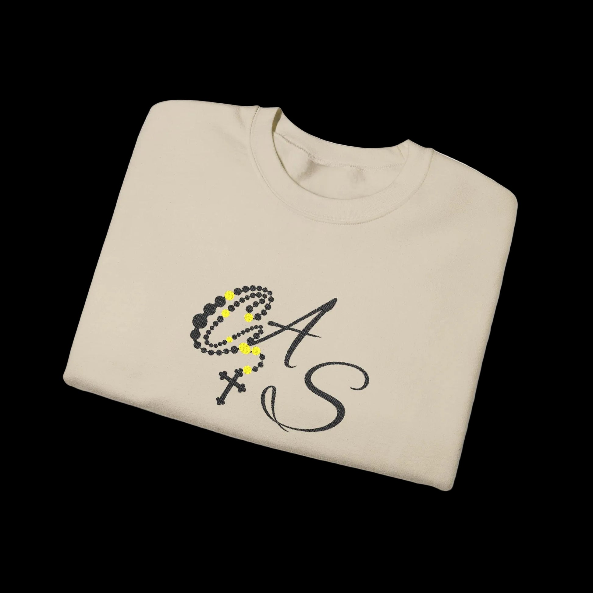 Folded beige sweatshirt with a logo and text on a white background